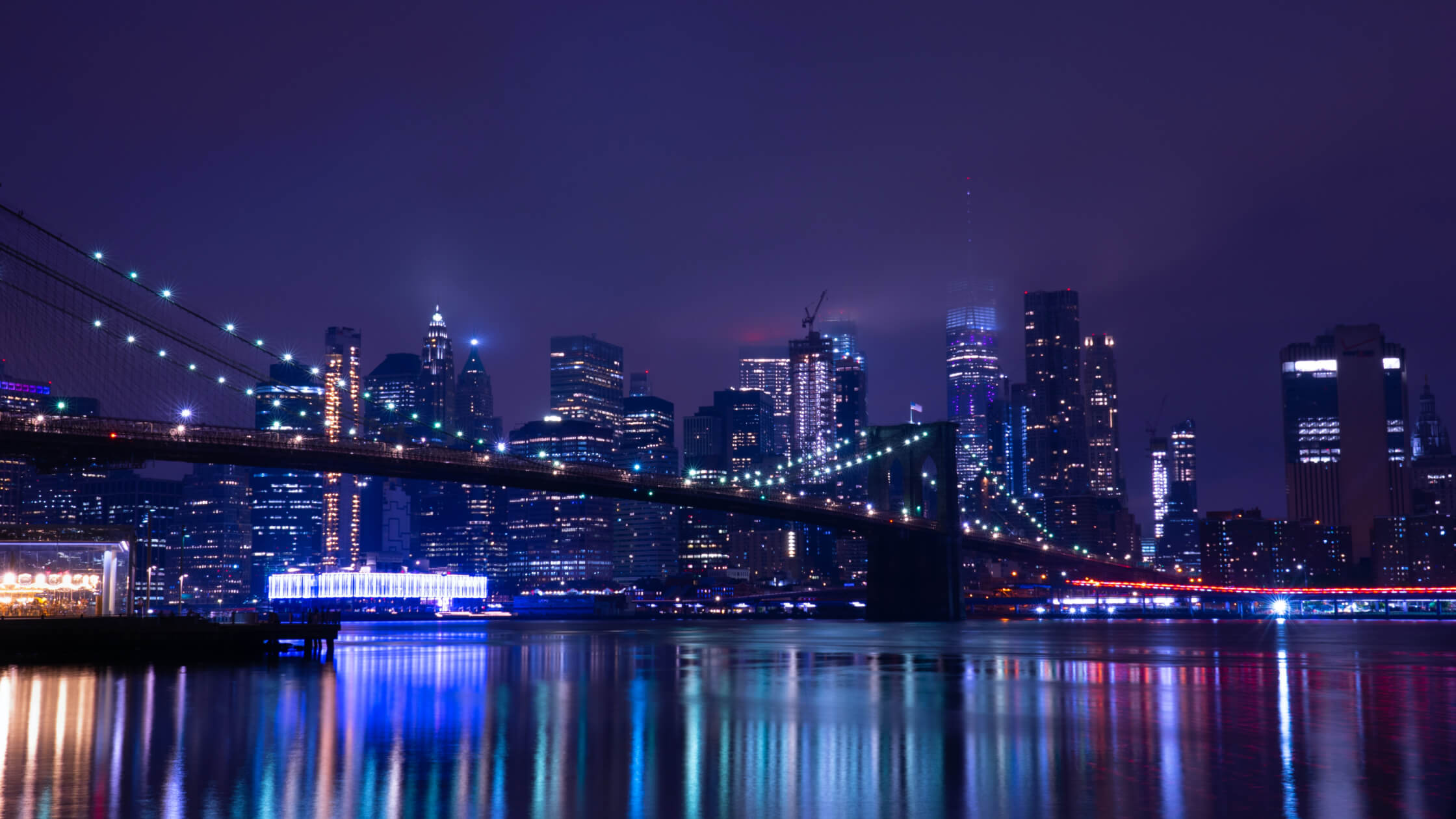 City skyline at night across the group commercial network